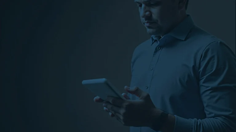 Analyst in newsroom reviewing tablet showing cross-border stablecoins, Meta icons, and a Stripe logo.